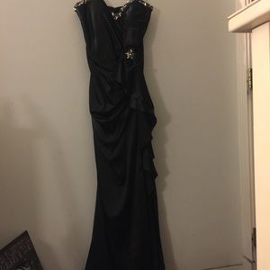 B. Dazzled black gown.